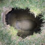 Body Found in Sinkhole Search