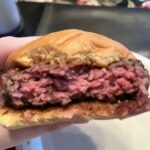 Undercooked Hamburger Scandal: Popular Restaurant Halts Customer Grilling Amid Food Poisoning Concerns